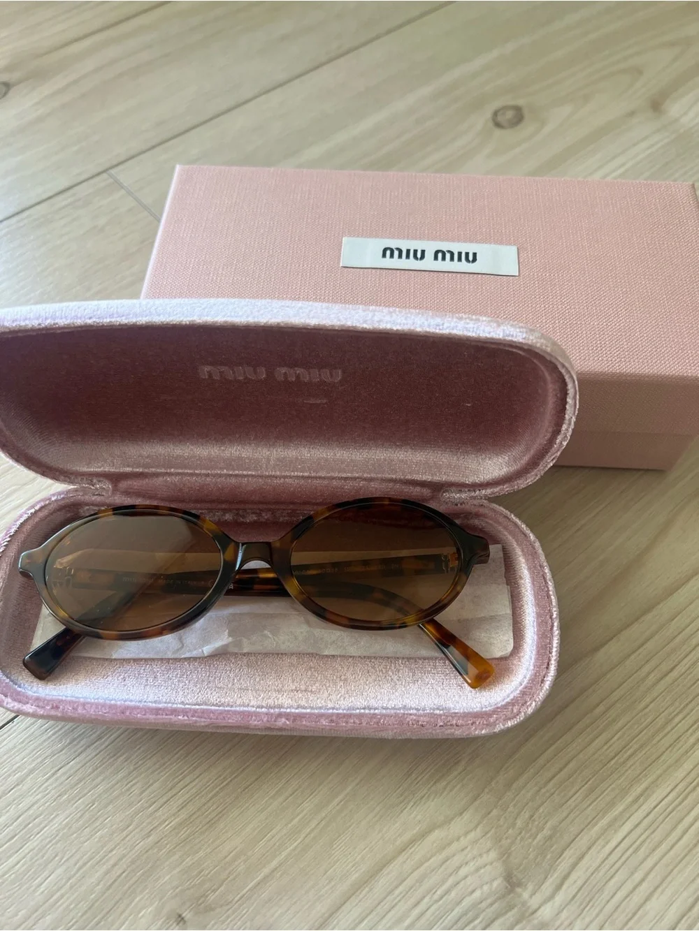 MIU MIU Tortoiseshell Oval frame full rim Sunglasses - Brown Lenses